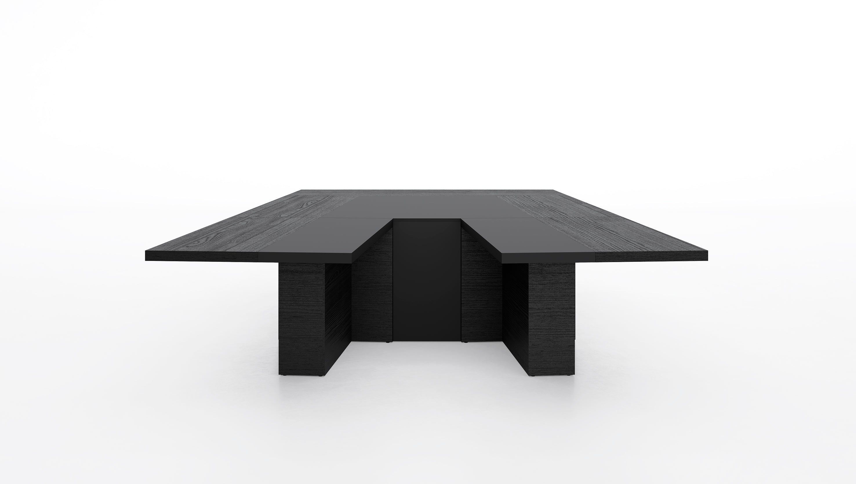 La table de réunion Mux70 de Stefano Boeri Interiors est une table rectangulaire noire moderne avec un large plateau plat et des pieds épais. Son design minimaliste et géométrique se détache sur le fond blanc.