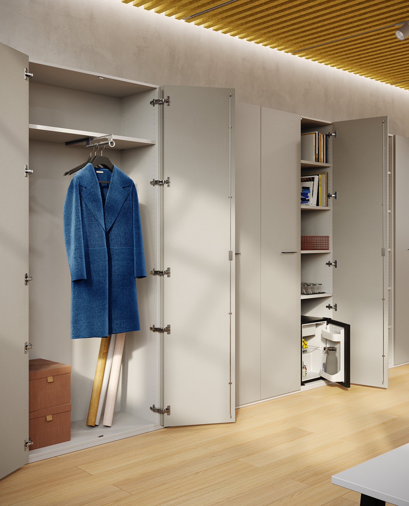 Les Armoires de bureau Passepartout d'Attitudes Bureaux, inspirées des armoires italiennes, proposent des rangements ouverts pour les manteaux, les livres, les boîtes et un coffre-fort, ainsi qu'une organisation sur-mesure et un panneau de plafond jaune.