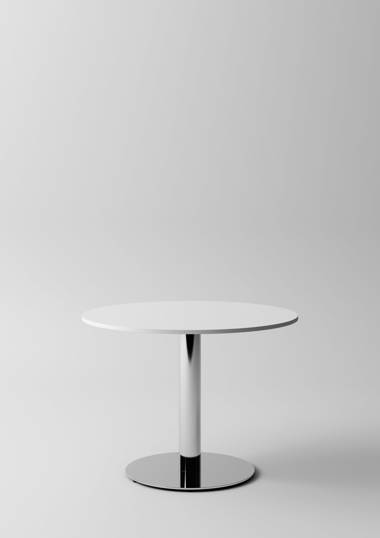 La Pop Tables de réunion et lounge d'Attitudes Bureaux est une table ronde moderne de couleur blanche avec un socle unique en métal, parfaite pour les salons ou les espaces de travail, présentée sur un fond gris clair.