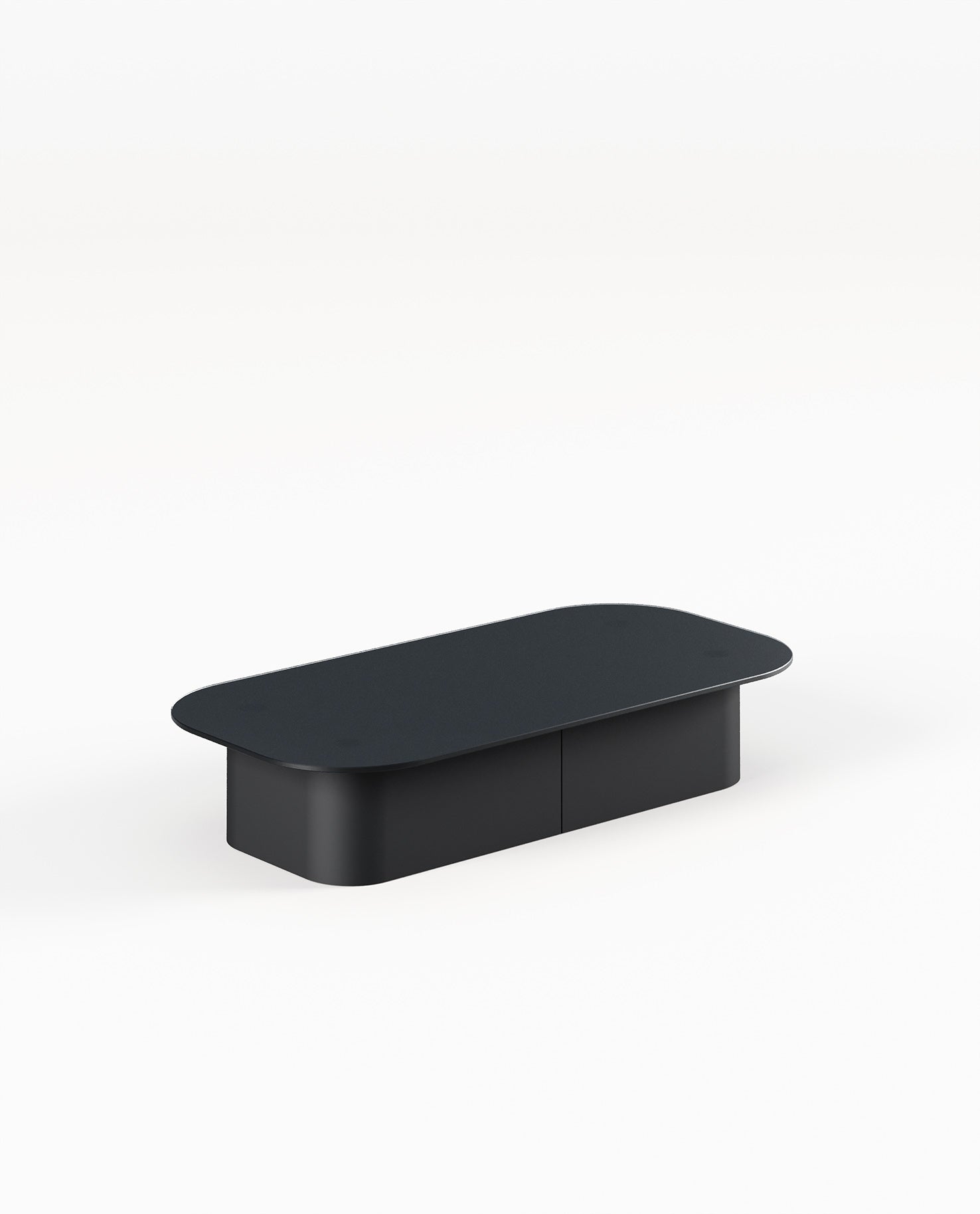 La table basse Afina de Ramos Bassols est une table basse noire moderne et minimaliste aux coins arrondis et au profil bas, parfaite pour les amateurs de designs rectangulaires épurés. Elle est présentée sur un fond blanc uni.